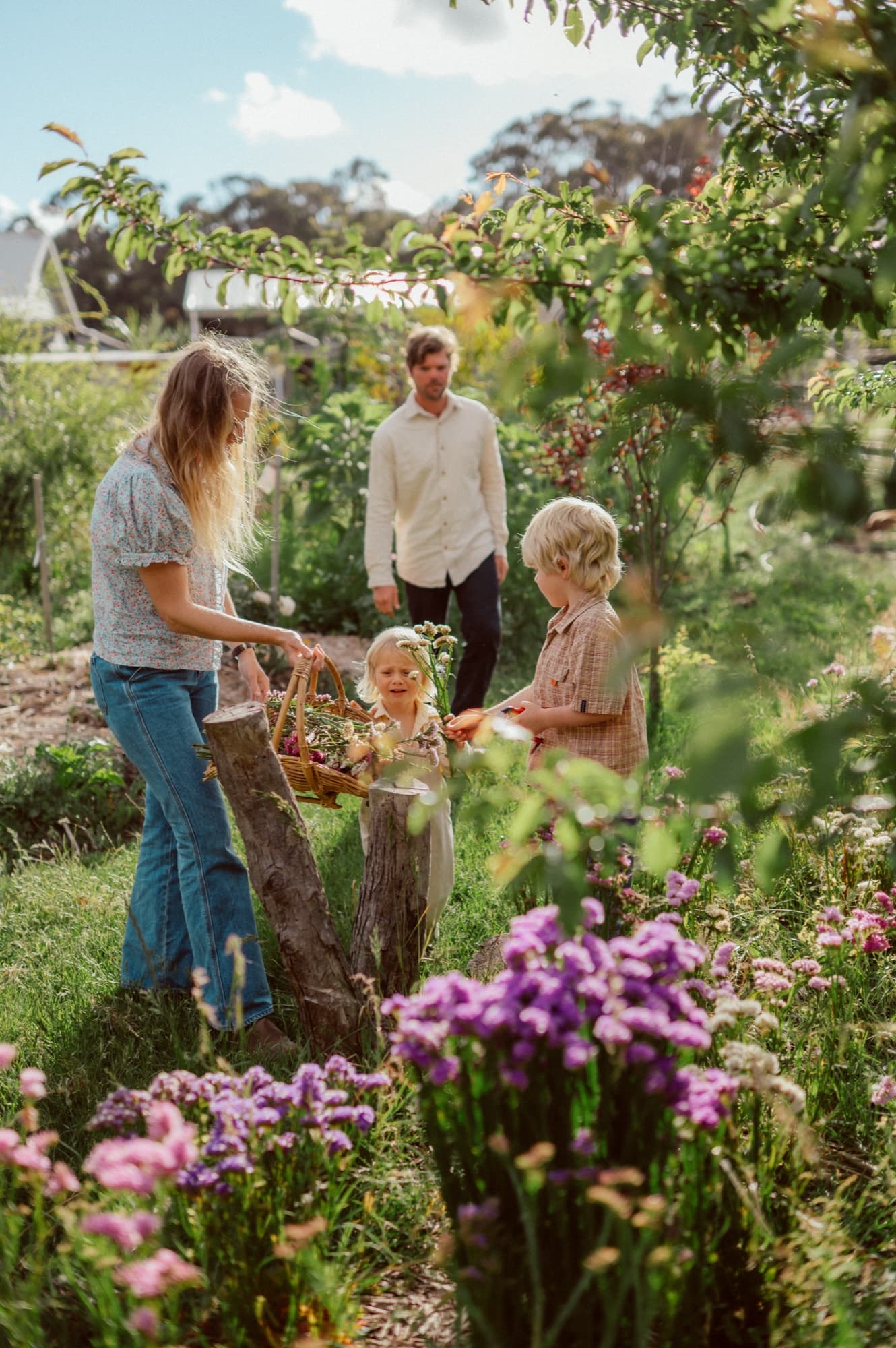 The family working together in the mixed cutting garden.